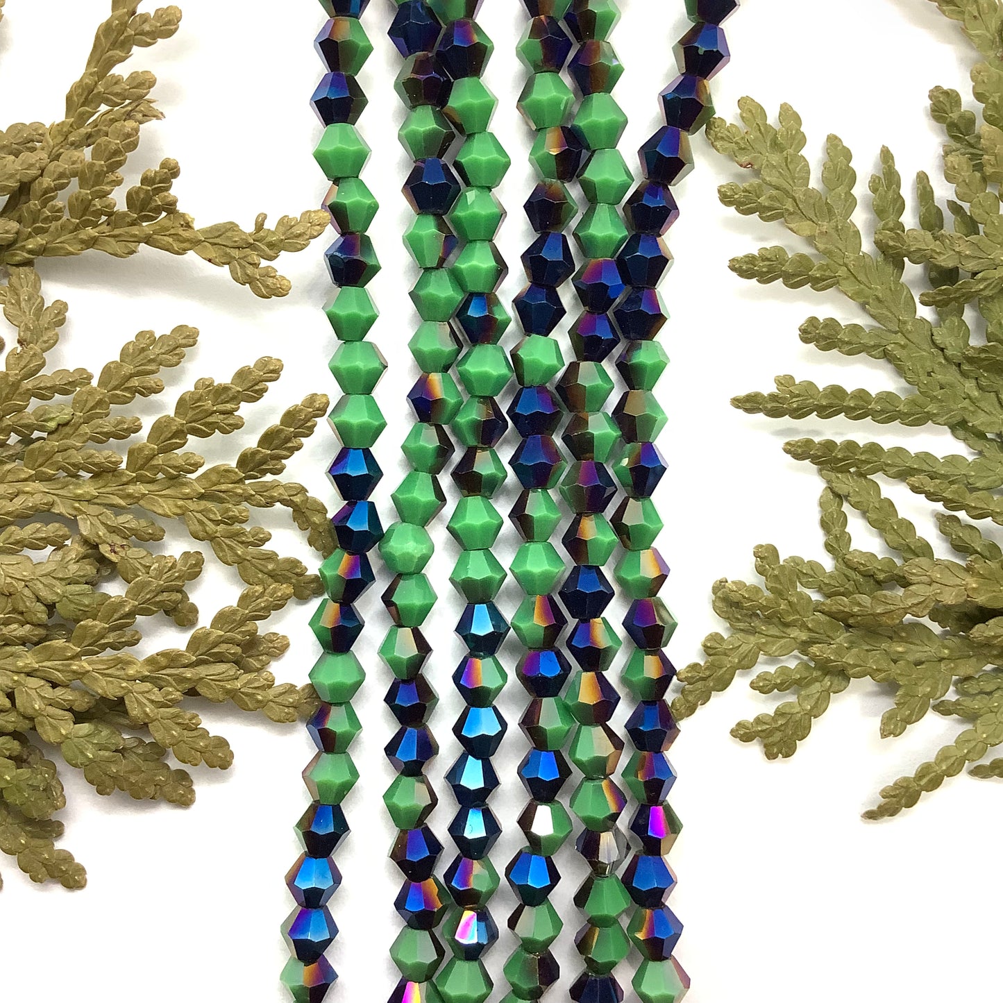 Crystal Bicone 4mm Opaque Dark Green w/ Half Blue Iris