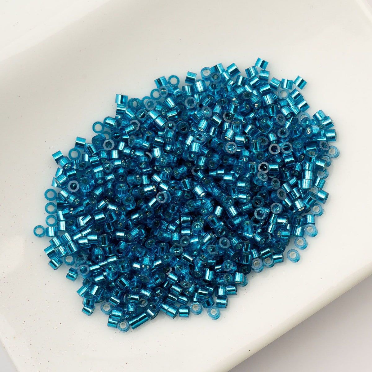 Capri Blue Silver Lined - Cylin Bead 11/0 - 25g