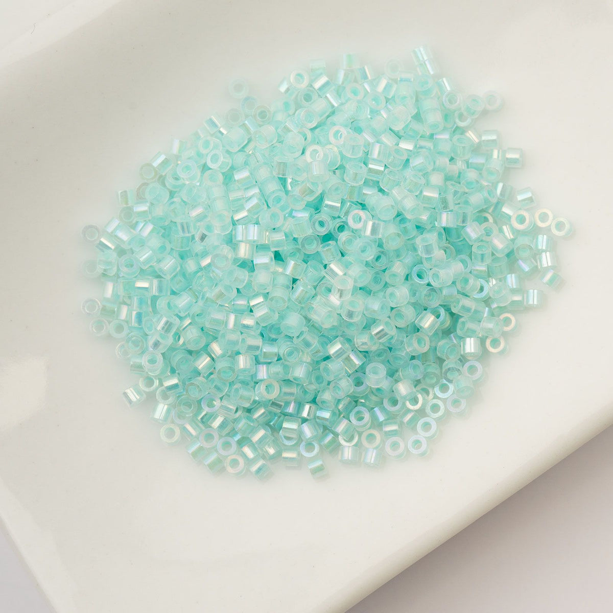 Turquoise Glow in the Dark AB - Cylin Bead 11/0 - 25g