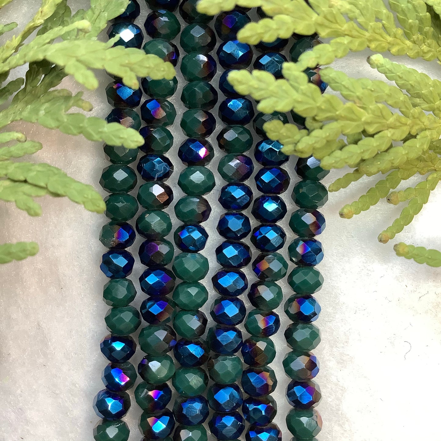 Crystal Rondelle 3x4mm Opaque Dark Green with Half Blue Iris